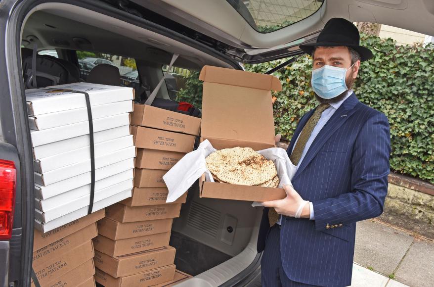 Rabbi Moshe Hecht has been making home deliveries to citizens of the Jewish community for Passover