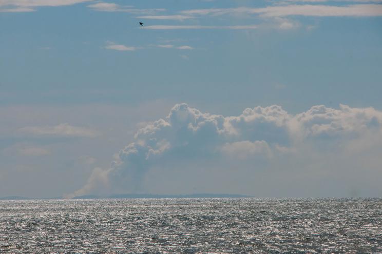 The eruption of Mount Anak Krakatau as seen from a beach in Serang, Banten, Indonesia, today.