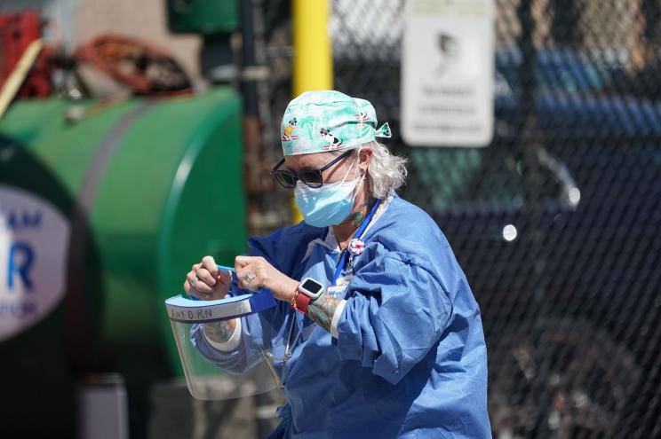 Nurse Amy OSullivan, walks outside of Wyckoff Hospital in the Borough of Brooklyn on April 6, 2020