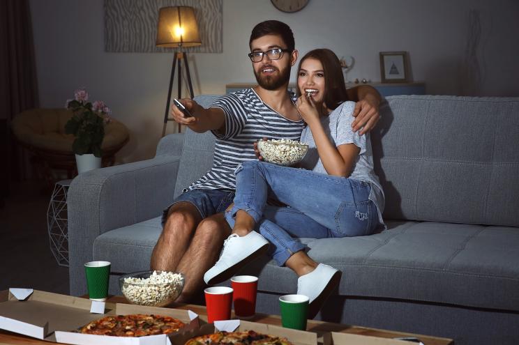 couple watching movies at home