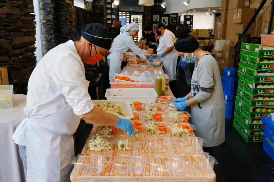 Michelin-Starred chef Xanty Elias assistants prepares free meals on April 24, 2020 in Huelva, Spain.Xanty Elias supported by his team and volunteers are serving free daily lunch to assisting NGO World Central Kitchen to distribute free meals to people in vulnerable situations due to the coronavirus (COVID-19) pandemic.