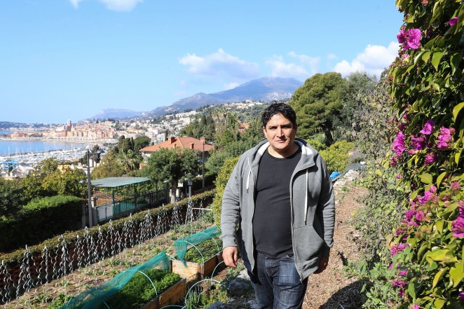 Colagreco walks in the vegetable garden of the "Mirazur" restaurant.