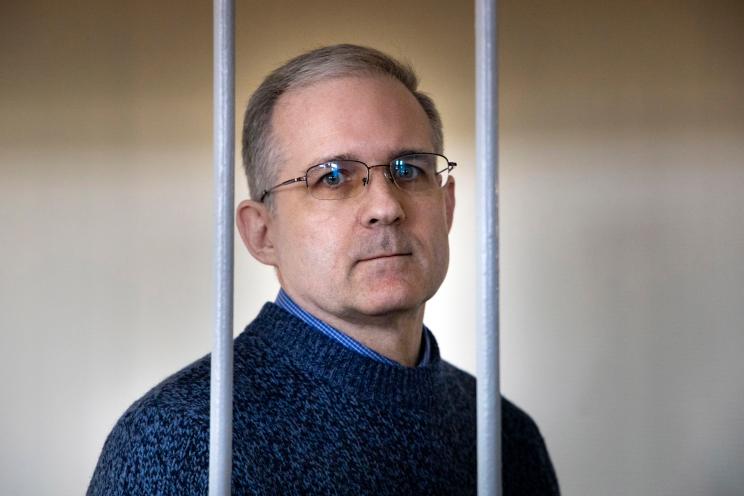 Paul Whelan standing in a cage before a court hearing in Moscow.