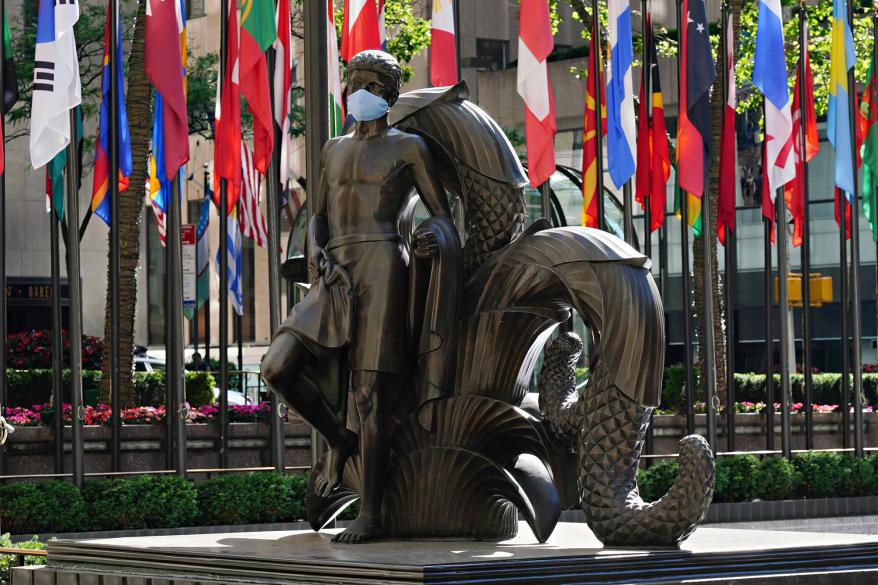 Paul Manship's 'Youth' statue in Rockefeller Center wears a mask