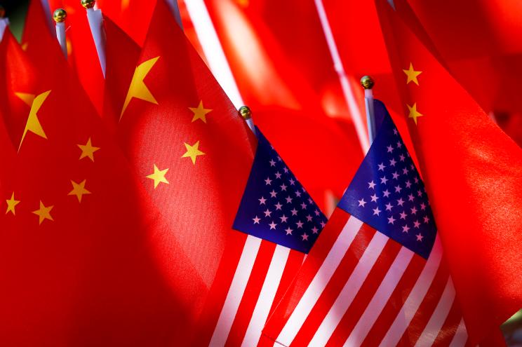 American flags are displayed together with Chinese flags