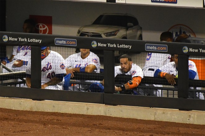 The Mets dugout looks on following Sunday's loss.