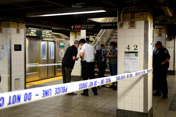 Police at the scene of a shooting on the 4 train platform at Grand Central Terminal today.