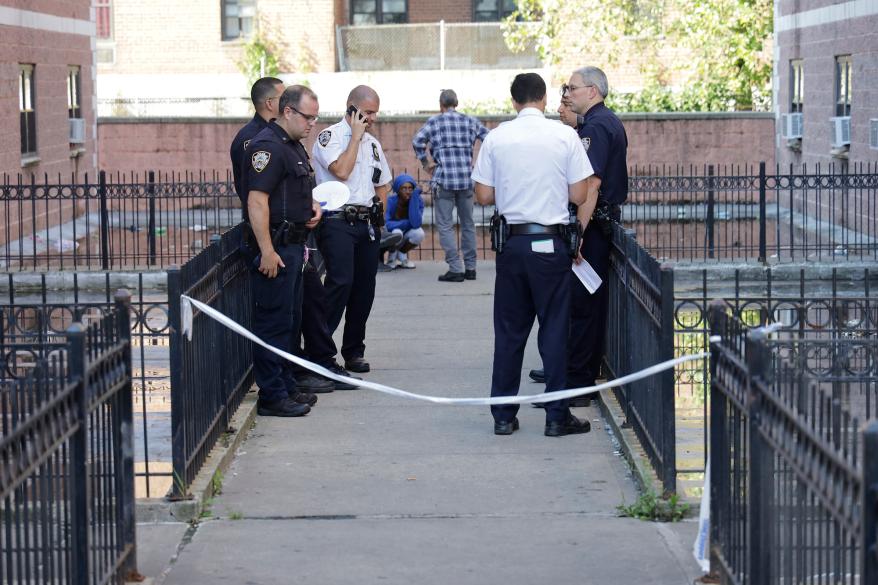 Authorities at the scene of another shooting in Queens today.