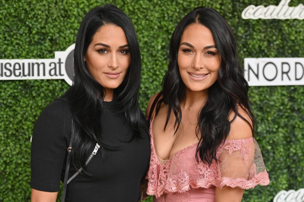 Professional wrestlers Brie and Nikki Bella aka 'The Bella Twins' attend the 2019 Couture Council Award Luncheon honoring French iconic footwear designer Christian Louboutin at the David H. Koch Theater on September 04, 2019 in New York City. (Photo by Angela Weiss / AFP) (Photo credit should read ANGELA WEISS/AFP via Getty Images)