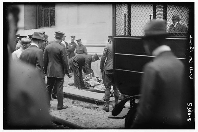 Bodies being removed after the Wall St. explosion.