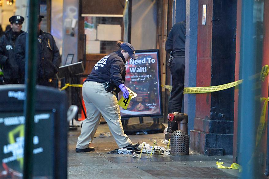 NYPD and FDNY respond when a piece of falling debris from the building