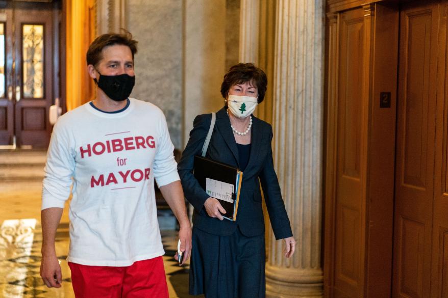 Sen. Ben Sasse and Sen. Susan Collins walking in the Capitol building on January 26, 2020.