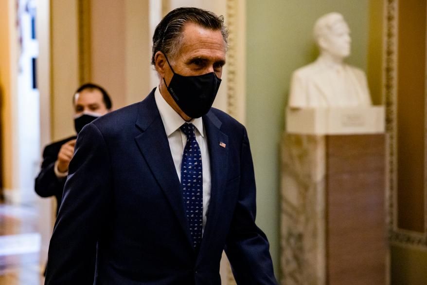 Sen. Mitt Romney on his way to the Senate floor on January 26, 2021.