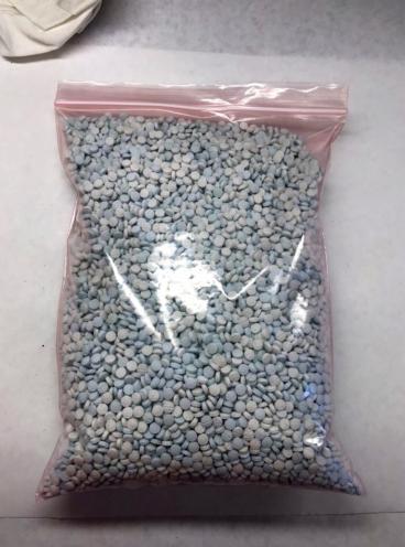 This undated file photo released by the Arizona office of the Drug Enforcement Administration shows some of the 1.1 million fentanyl pills that have been seized in the state this fiscal year.