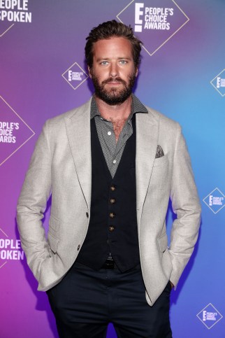 Armie Hammer attends the 2020 E! People's Choice Awards held at the Barker Hangar in Santa Monica, California.