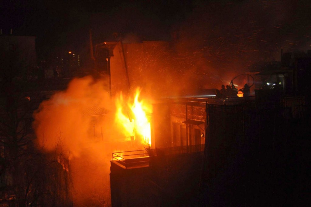 Firefighter Michael R. Davidson of Engine Company 69, died after he became separated from his unit as they battled the fierce, smoky blaze that broke out in the basement of a former Harlem jazz club being used as a film set for "Motherless Brooklyn," directed by Edward Norton. (AP Photo/J.E. Alexander)