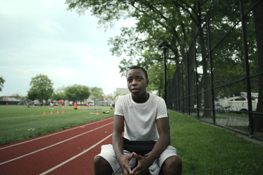 Kenan, an eighth-grader and quarterback for the oldest squad, is an aspiring engineer who spends just as much time competing in robotics as he does football.