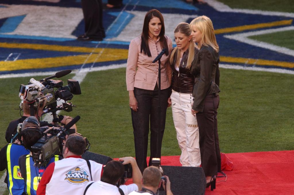 Recording artists The Dixie Chicks perform the National Anthem before Super Bowl XXXVII between the Tampa Bay Buccaneers and the Oakland Raiders on January 26, 2003 at Qualcomm Stadium in San Diego, California.