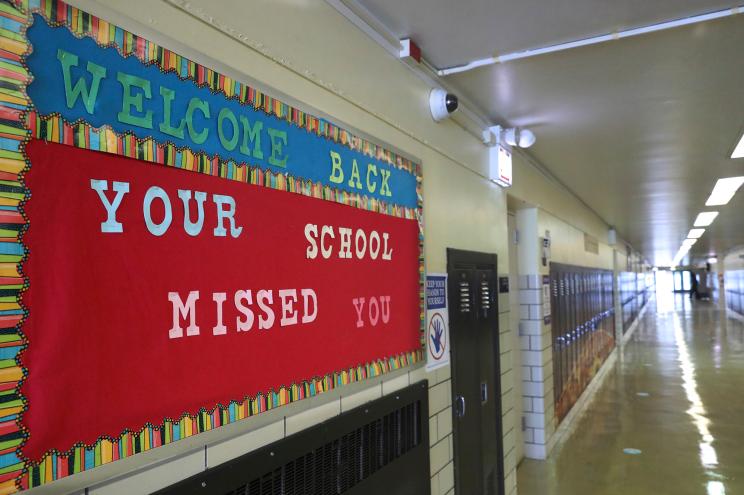 A Welcome Back sign on a bulletin board greets returning students at Chicago's William H. Brown Elementary School.