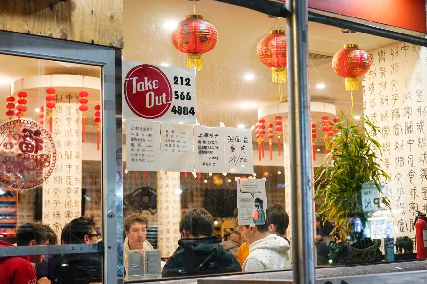 People inside New Shanghai Deluxe restaurant in Chinatown.