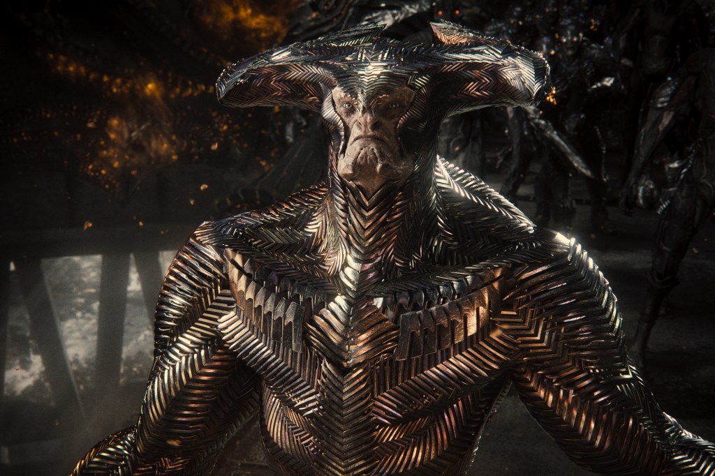 Steppenwolf (voiced by Ciarán Hinds) looks like he borrowed his new outfit from Lady Gaga.