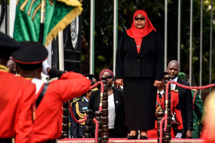 New Tanzanian President Samia Suluhu Hassan, inspects a military parade following her swearing in the country's first female President