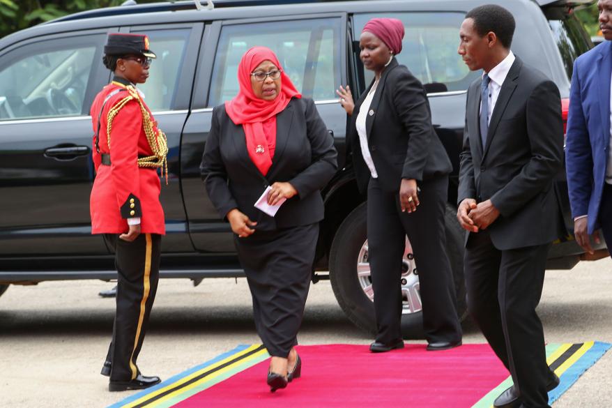 Suluhu Hassan arrives to sign a book of condolences for former president John Magufuli.