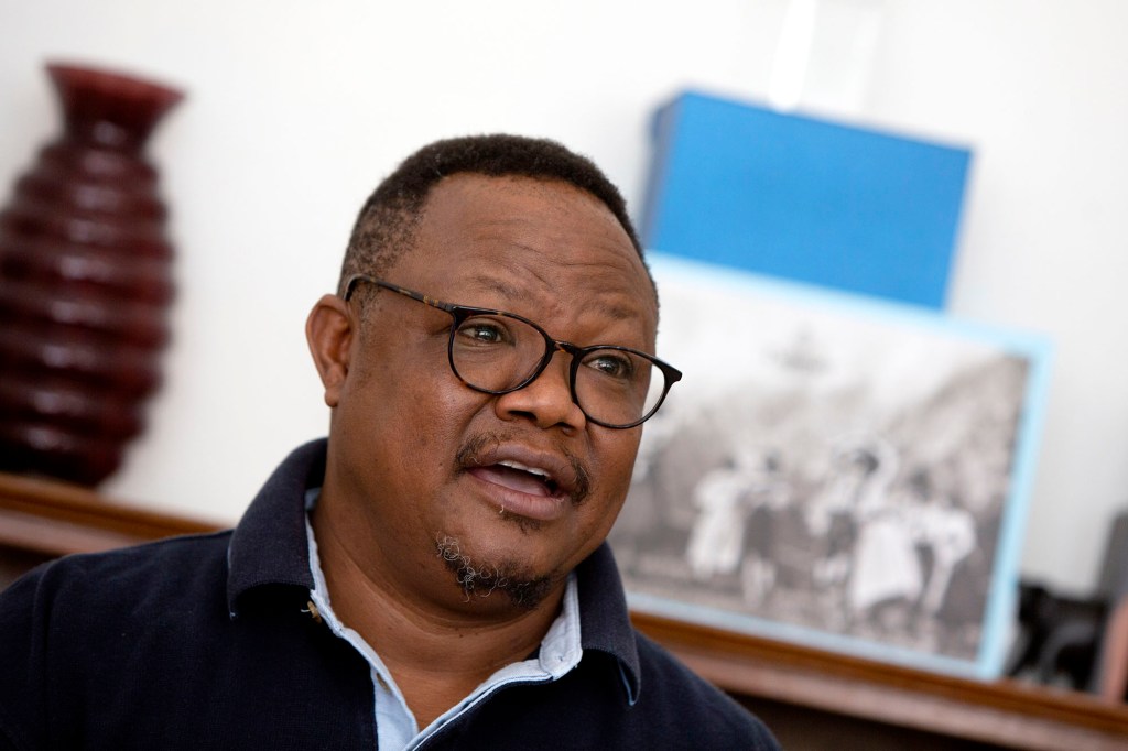 Exiled Tanzanian opposition leader Tundu Lissu gives an interview to The Associated Press in Tienen, Belgium.