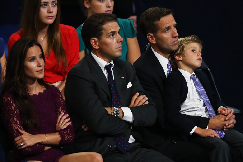 Beau Biden (right), Hunter Biden, and Ashley Biden (left), watch their father then- Vice President Joe Biden speak on stage during the final day of the Democratic National Convention at Time Warner Cable Arena on September 6, 2012 in Charlotte, North Carolina.
