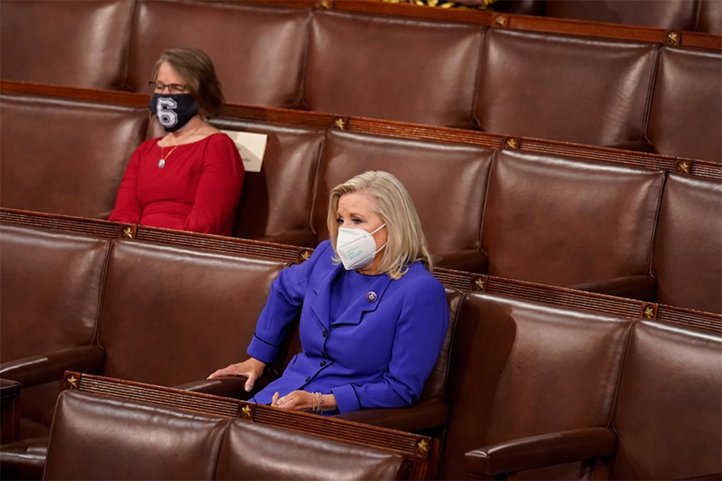 Rep. Liz Cheney listens to President Joe Biden during his first joint congressional address on April 28, 2021.