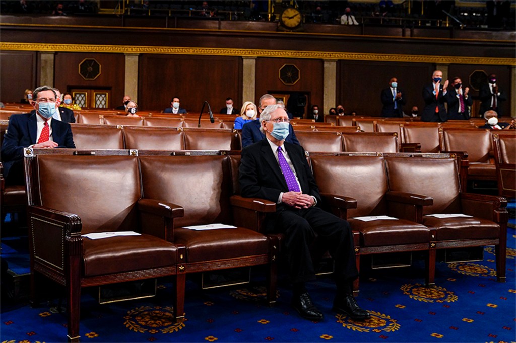 Senate Minority Leader Mitch McConnell is among several Republicans who showed up to Biden's first congressional speech on April 28, 2021.