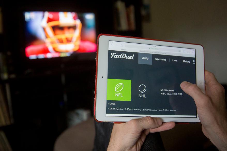 The FanDuel Inc. website is arranged for a photograph on an Apple Inc. iPad in Washington, D.C., U.S., on Sunday, Oct. 4, 2015.