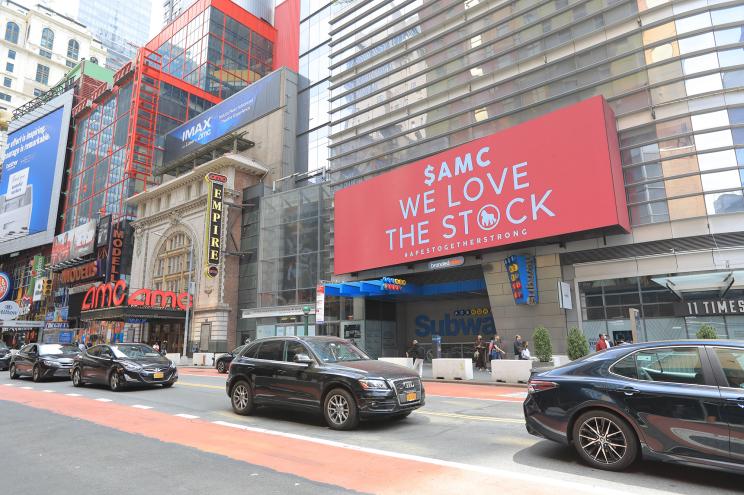 AMC's newest shareholders often call themselves "apes" and love to flaunt attention through billboards such as this one by an AMC theater in 42nd Street, Manhattan.