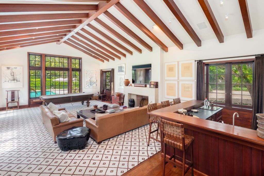 The informal den with a pool table. 