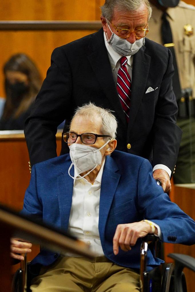 Robert Durst is assisted by his attorney Dick DeGuerin (R) as he appears in the courtroom for his murder trial at the Inglewood Courthouse