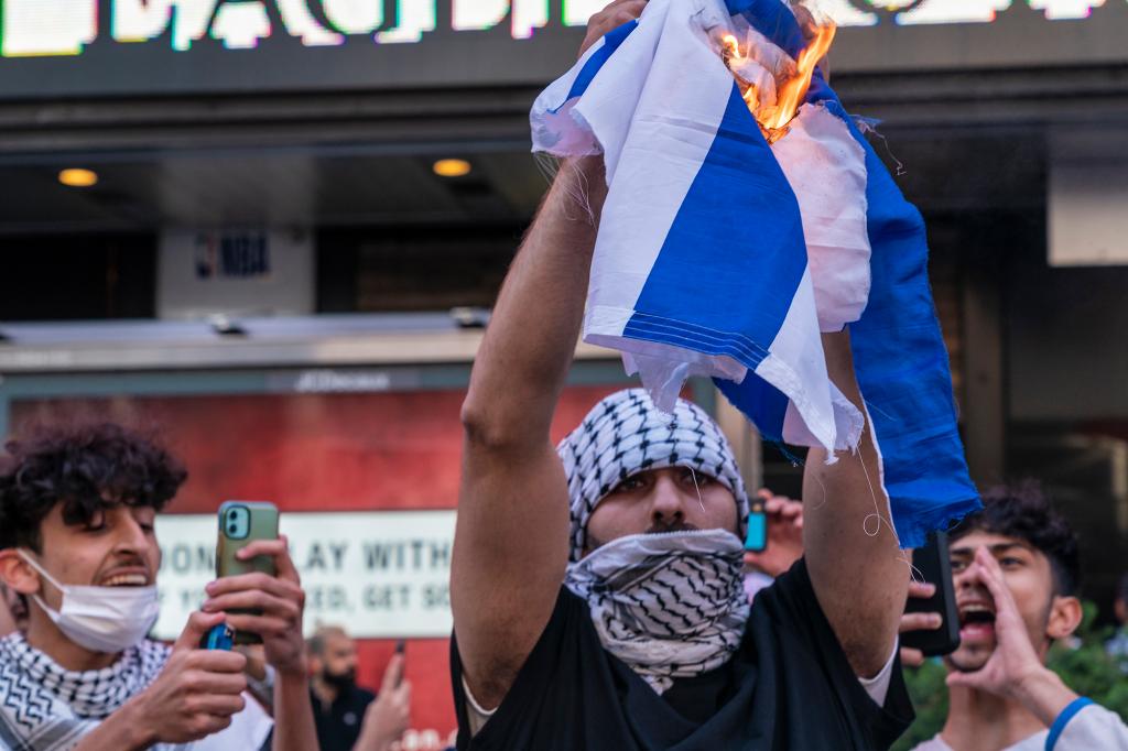 Pro-Israel and pro-Palestinian protesters clash with each other on Times Square on May 20, 2021.