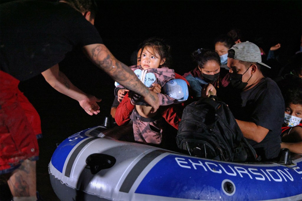 Immigrants arrive from Mexico through boats in Roma, Texas on April 15, 2021.