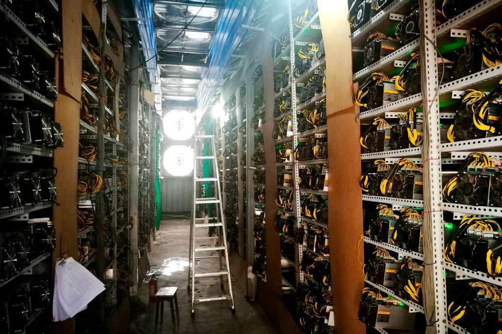 Bitcoin mining machines seen running at a bitcoin farm in Mabian Yi Autonomous County, China.