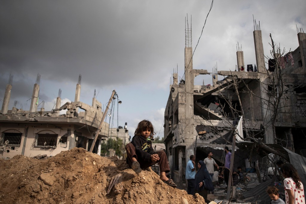 Palestinians return to their destroyed homes in  Beit Hanoun, following a cease-fire reached after an 11-day war between Gaza's Hamas rulers and Israel.