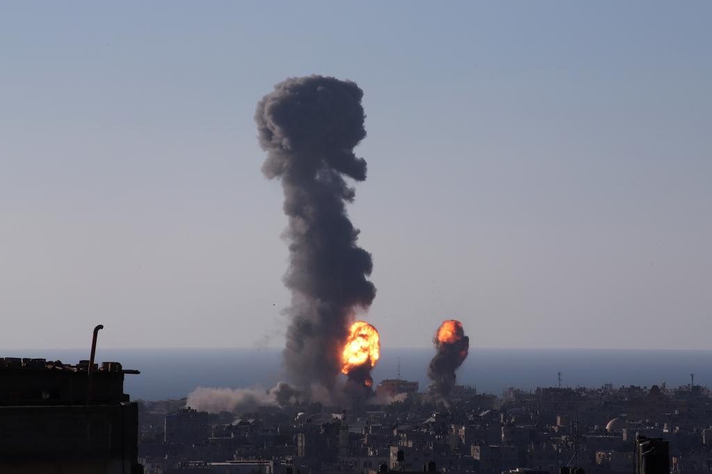 Explosions follow Israeli airstrikes in the southern Gaza Strip city of Rafah, on May 13, 2021.