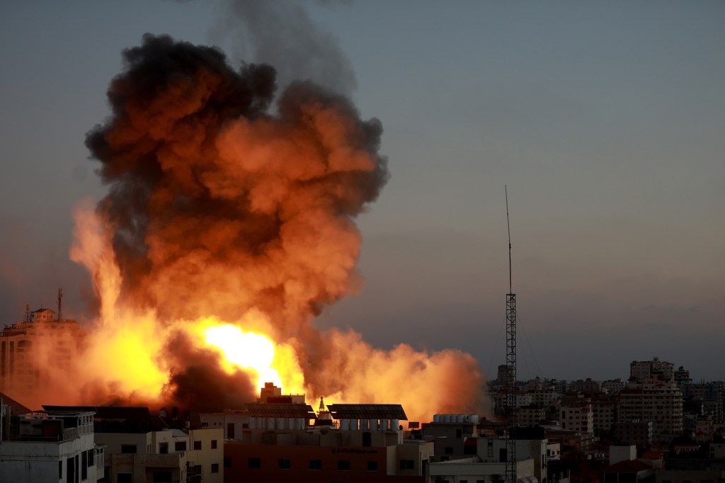 The aftermath of an Israeli airstrike is seen in Gaza City on may 14, 2021. 