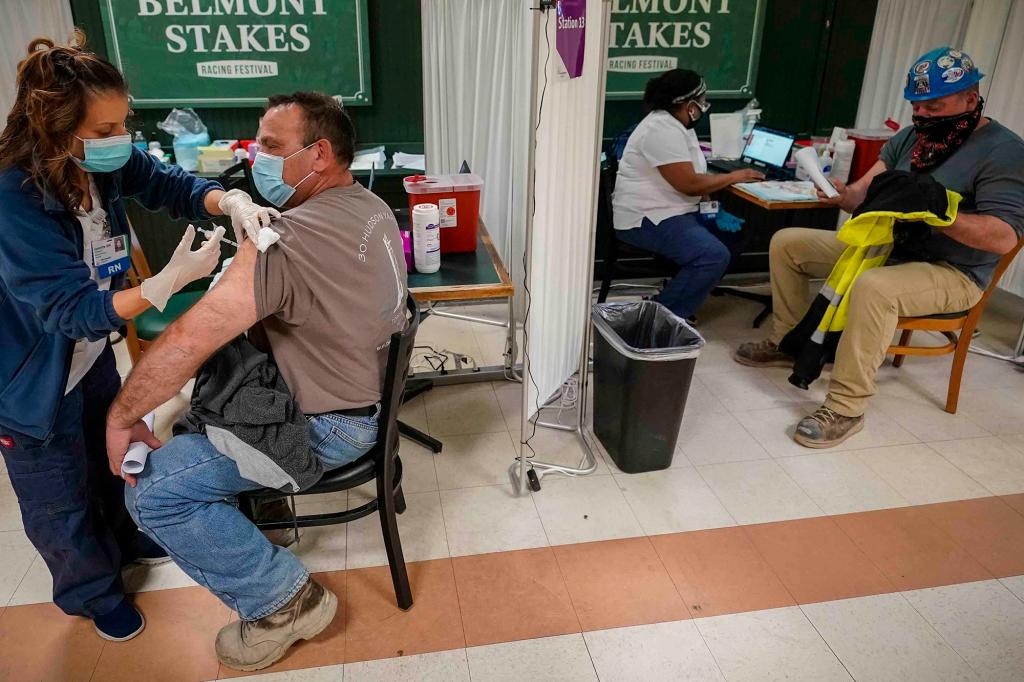 New Yorkers getting vaccinated against COVID-19 at Belmont Park in Elmont, New York.