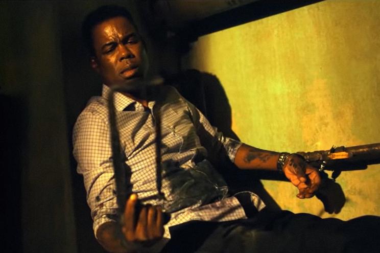 Chris Rock stars in the ninth film in the "Saw" franchise, called "Spiral," which goes easier on the gore and brutality.