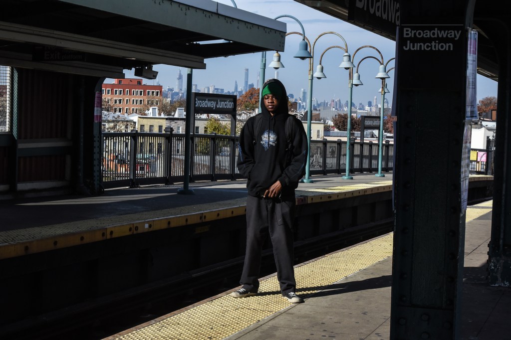 A person waits for a subway train.