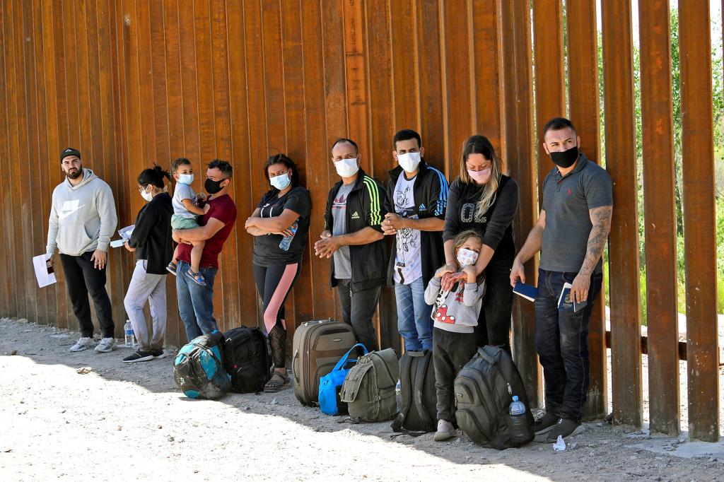 US Customs and Border Protection agents detain migrants in San Luis, Arizona on May 21, 2021.