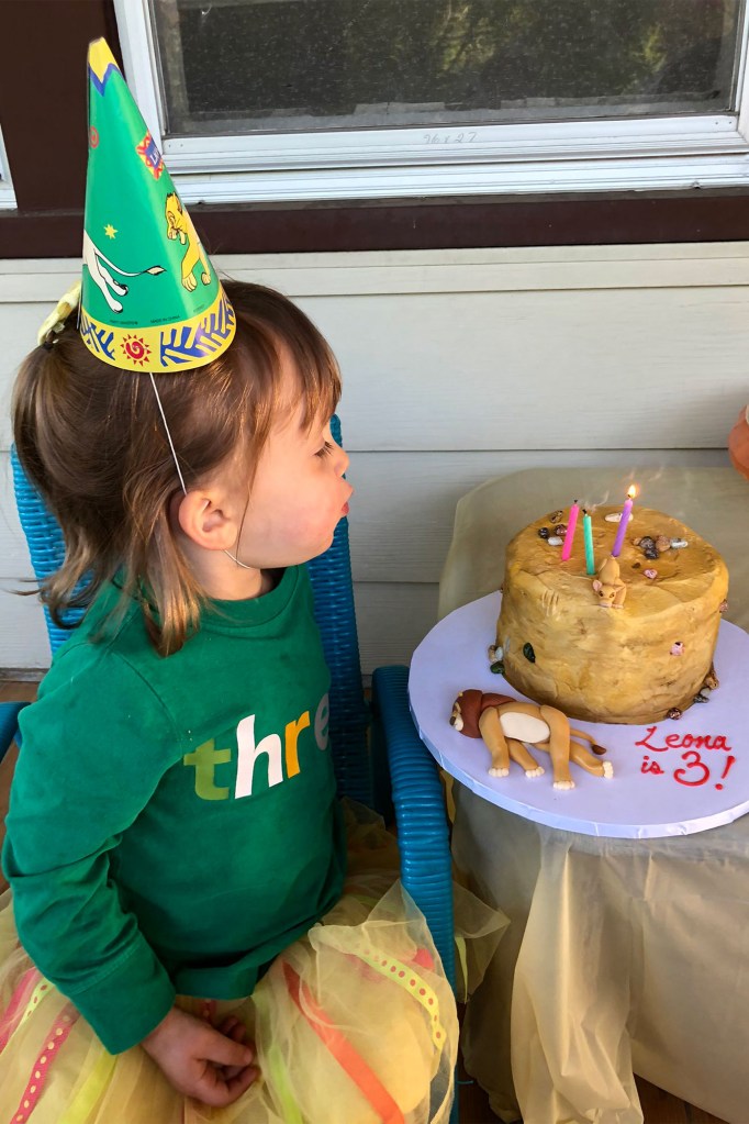 Three-year-old Leona Feigh was more than happy to blow her birthday cake. 

