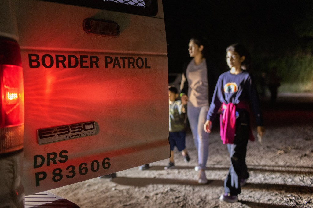 A group of Venezuelan immigrants is taken into U.S. Border Patrol custody.