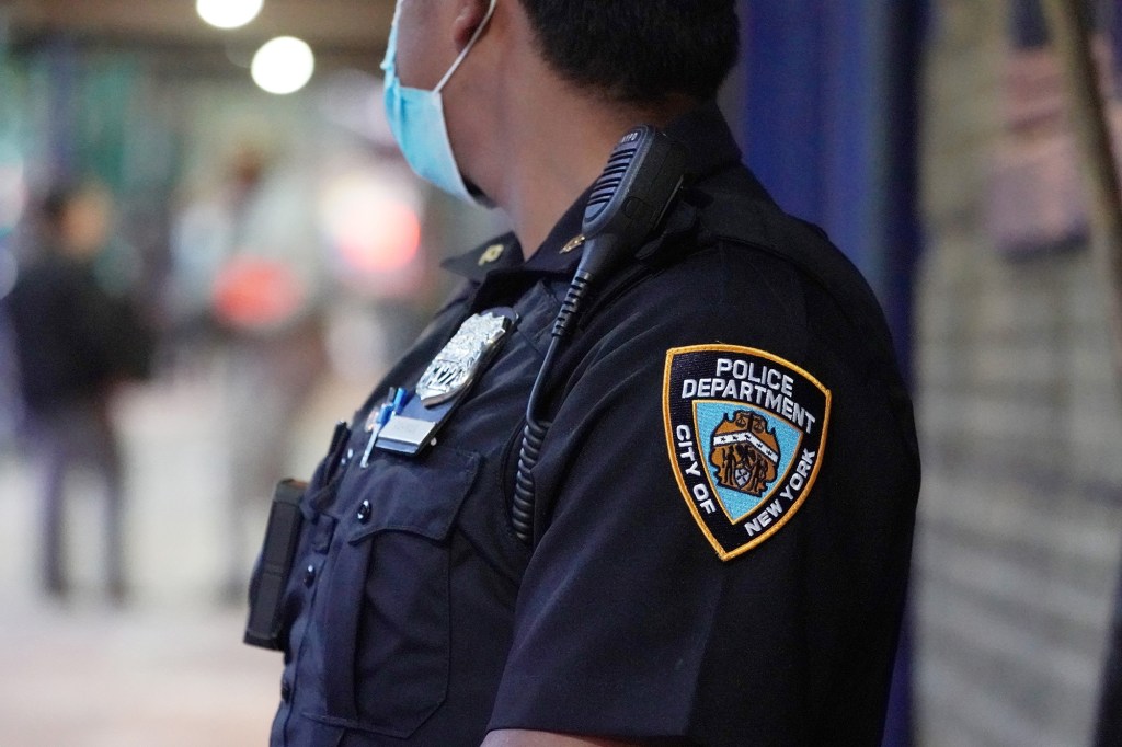 A general view of an NYPD officer wearing a face mask.