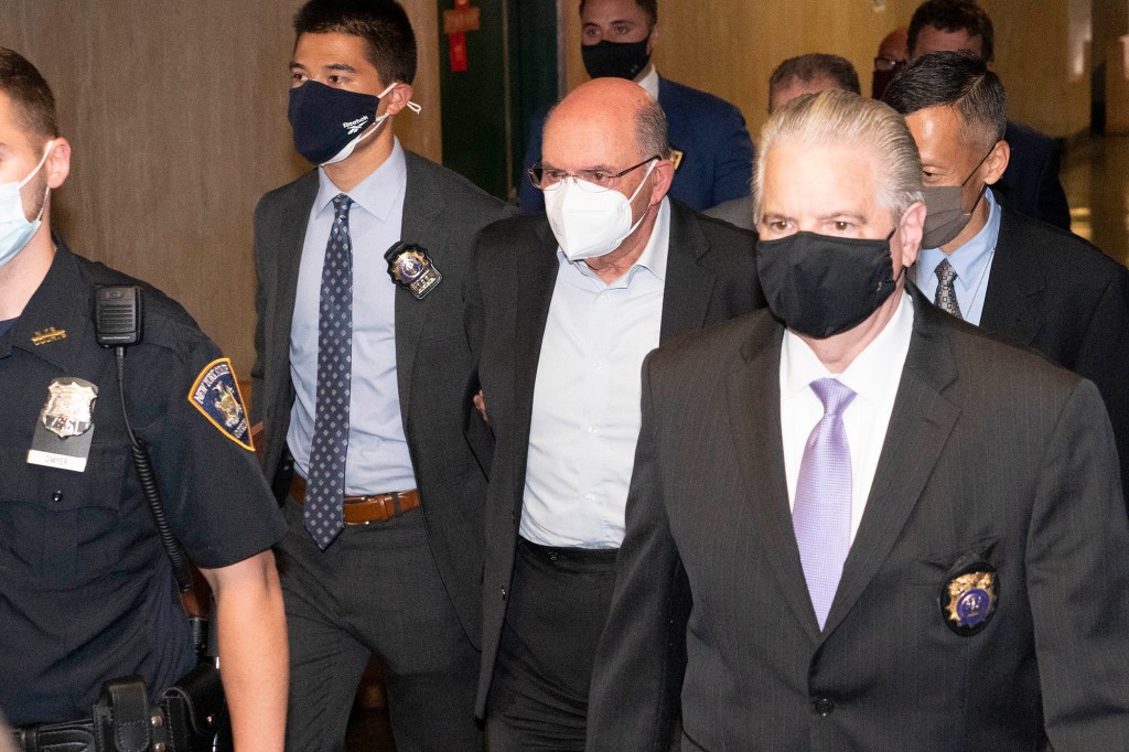 Allen Weisselberg (center) arrives to attend the hearing for the criminal case at the criminal court in lower Manhattan in New York on July 1, 2021.