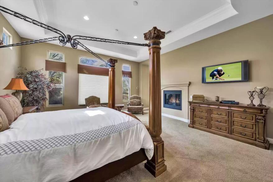 One of the home's bedrooms is pictured from another angle.